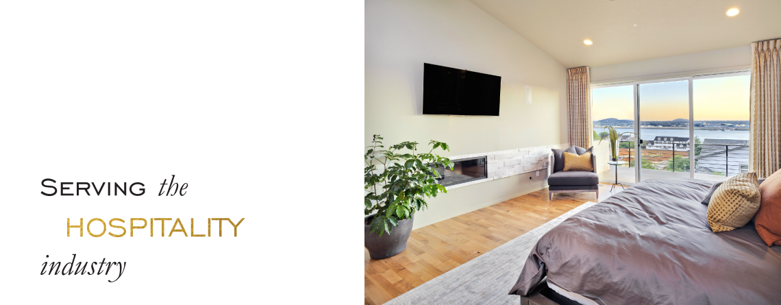 Luxury hotel suite with waterfront view and contemporary furnishings